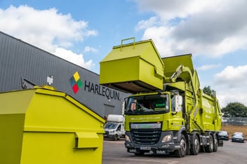 CIRQLR commercial waste and recycling vehicles and containers at an industrial facility